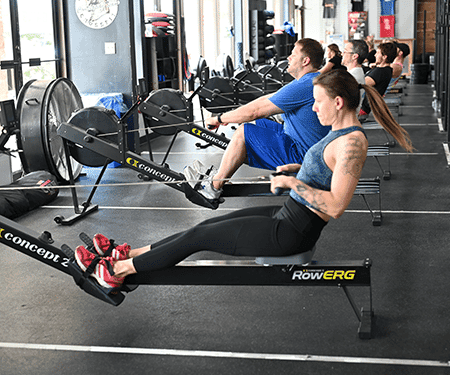 Coach guiding a CrossFit class at Man O' War Fitness, Lexington KY.
