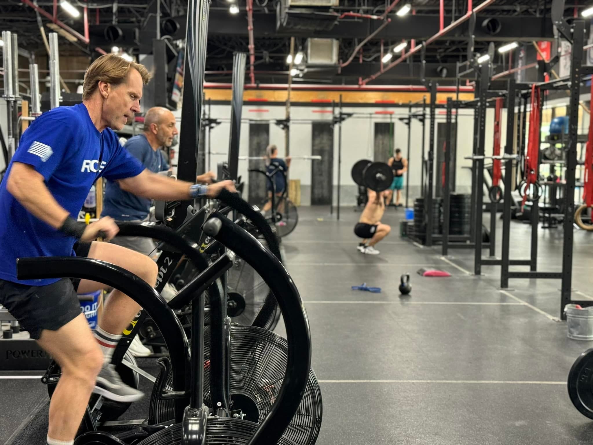 Members training on the air bikes at Man O' War Fitness in Lexington, KY.