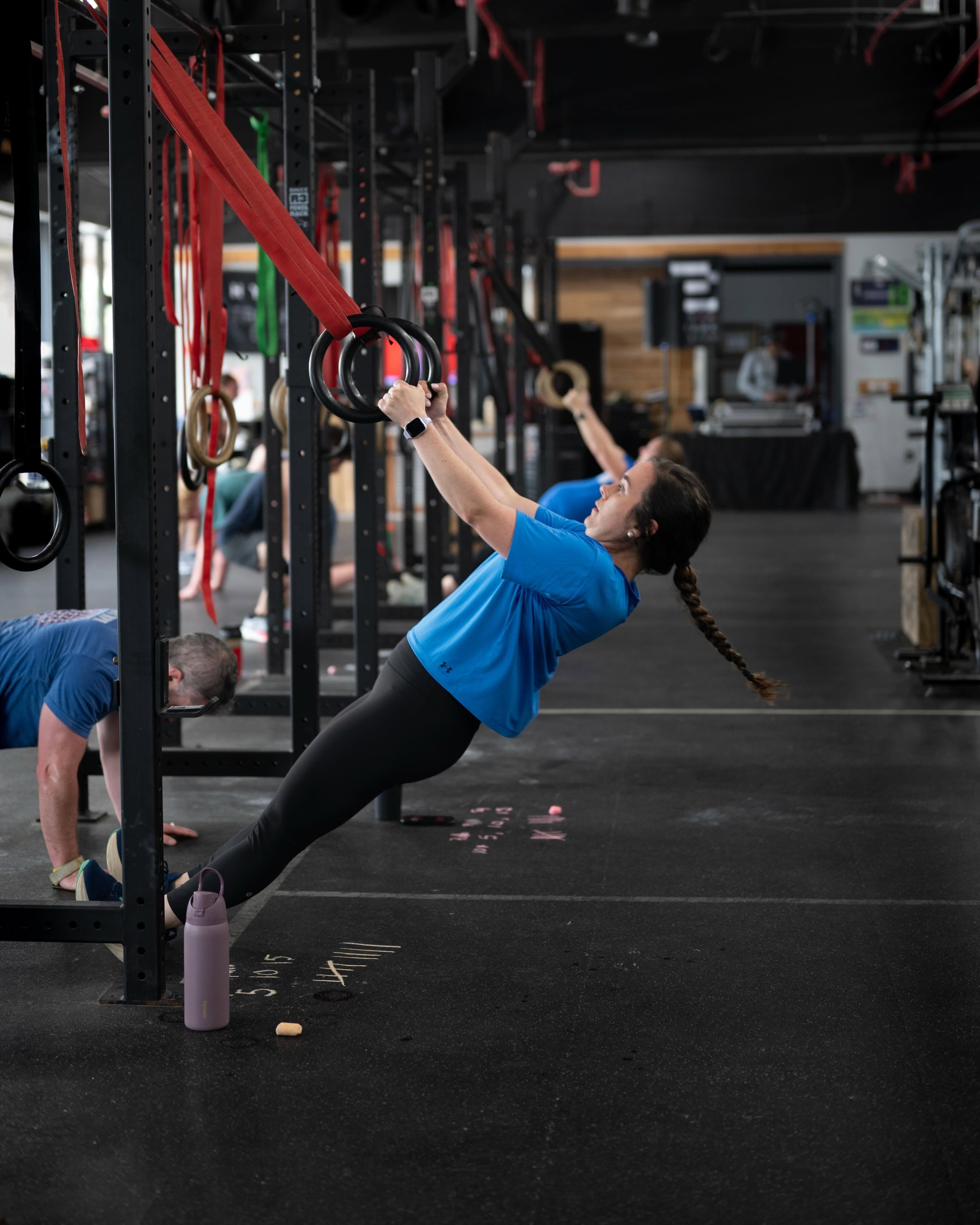 A member training on the gymnastics rings at Man O' War Fitness in Lexington, KY.